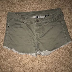 Green H&M shorts.